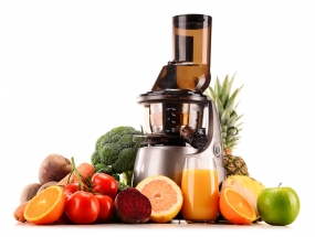 Bigstock-slow-juicer-with-organic-fruit-89559947